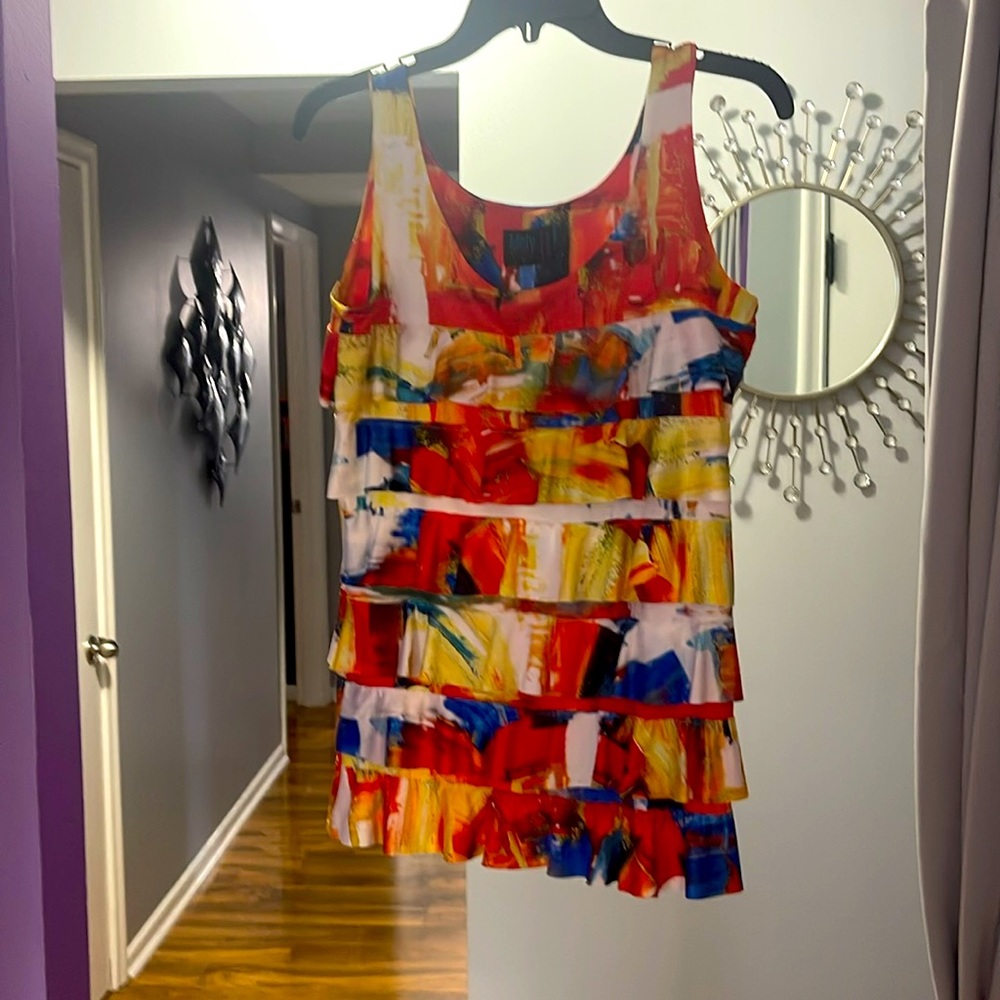 Mely multi color sleeveless blouse size small.